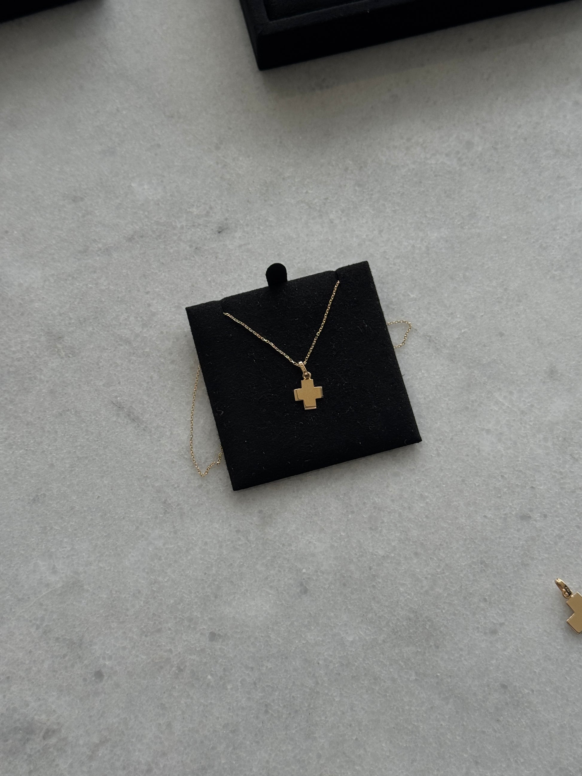 Cross charm